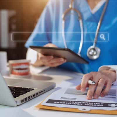 woman holding tablet