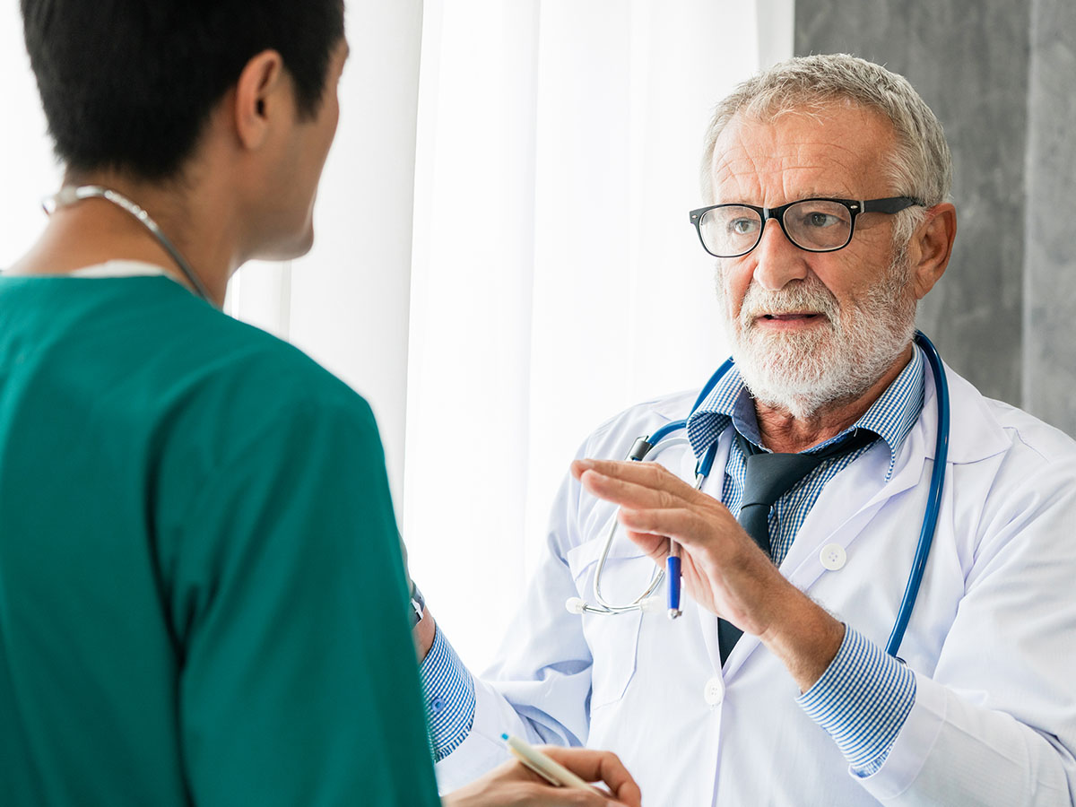 Doctor talking to nurse