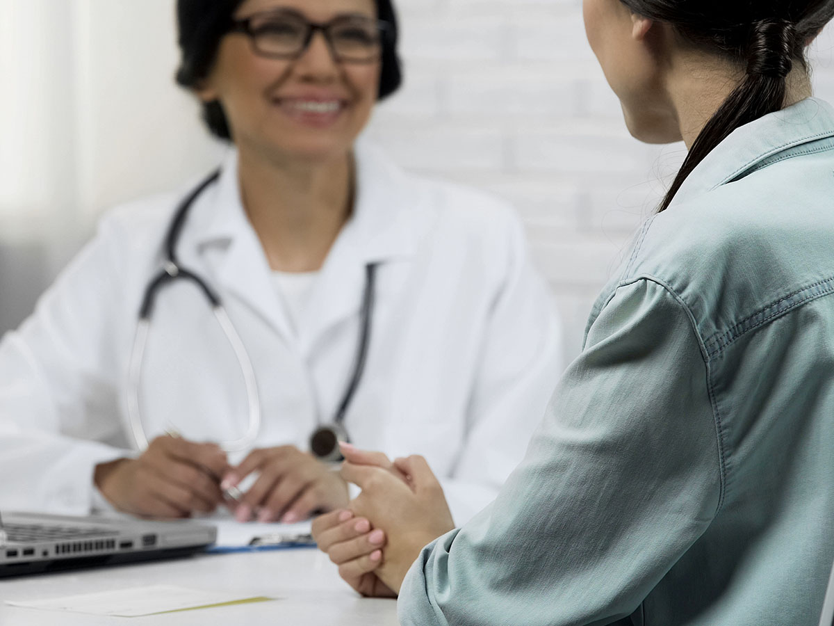 Patient talking to doctor