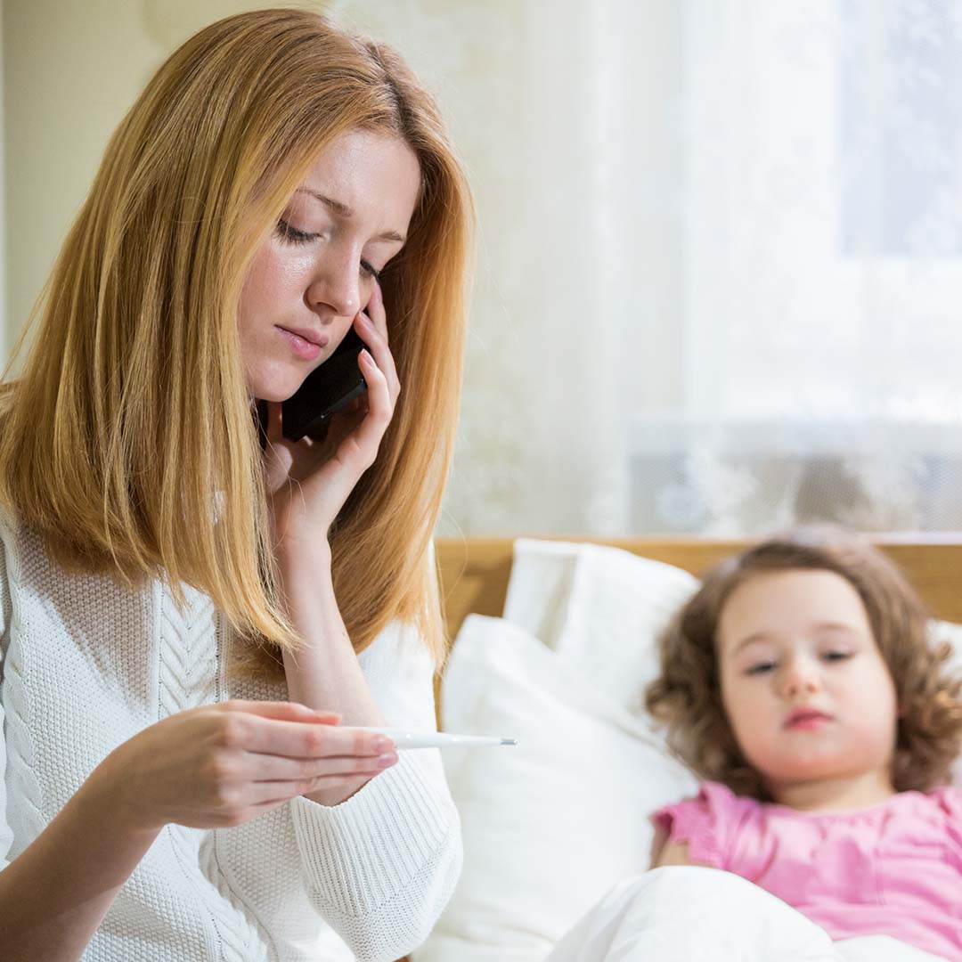 young mother with sick child