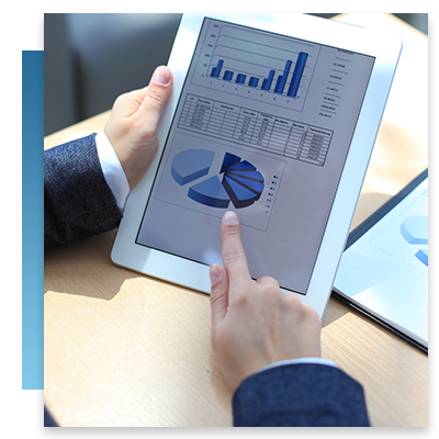 A business owners looking at finances on their tablet