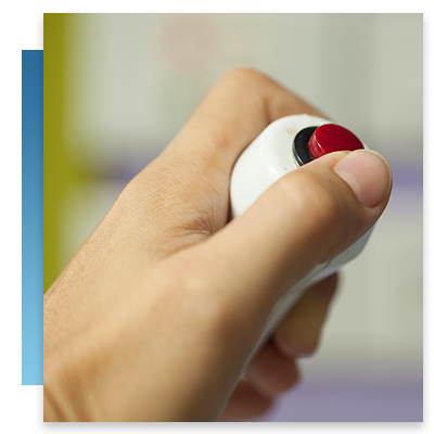 A patient with an emergency button in their hand