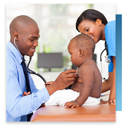 A doctor and nurse doing a checkup on a toddler