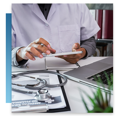 A doctor adding patient information on a tablet