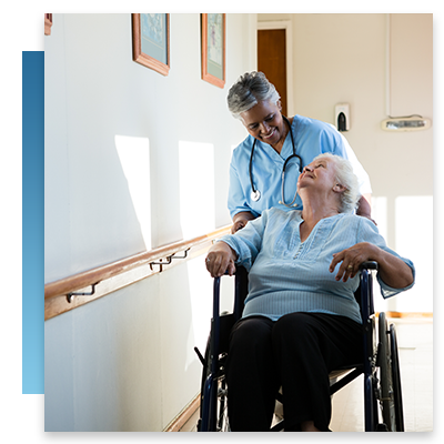 A nurse pushing a patient in a wheelchair