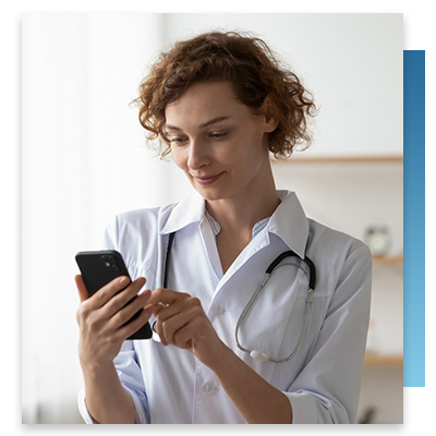 A nurse looking at her phone