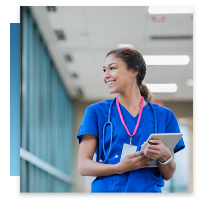 A nurse looking off to the side while smiling and holding a tablet