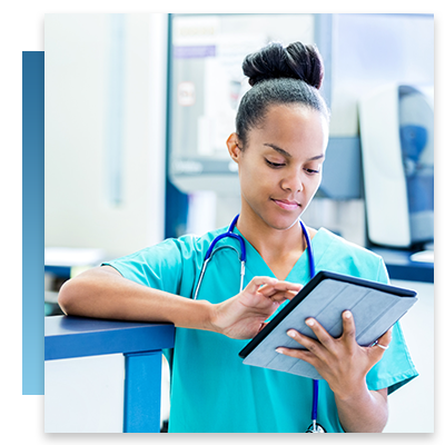 A nurse using her tablet in a hospital
