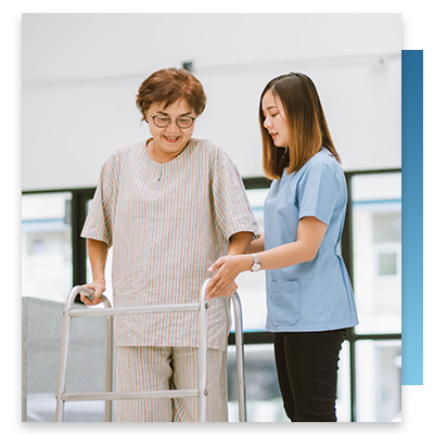  A nurse helping a patient with a walker