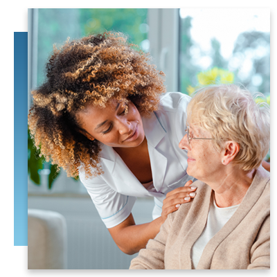 A nurse checking on an elderly resident in a nursing home