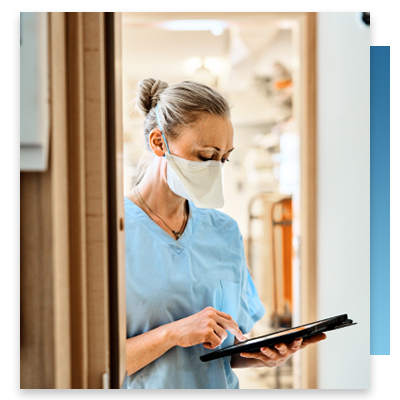 A nurse walking into a patient's room