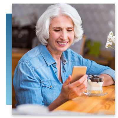 A older woman looking at her phone