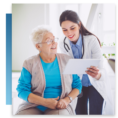 A doctor and patient looking at health info on a tablet