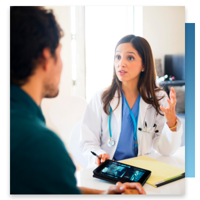 A doctor speaking with a patient