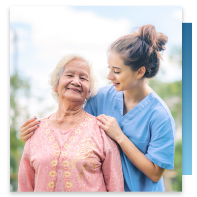 A smiling senior patient and nurse
