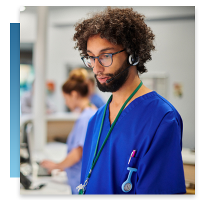 A nurse at a call station on a wireless phone