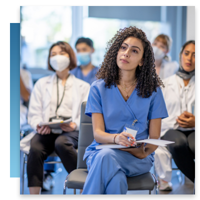 A nurse at a training meeting
