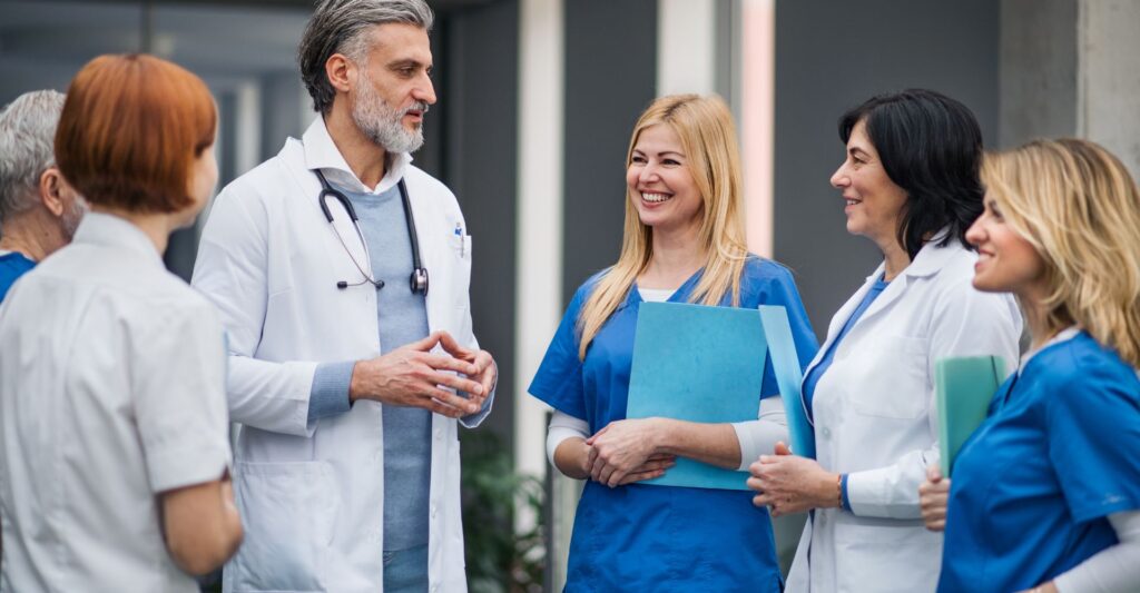 A group of doctors and nurses talking