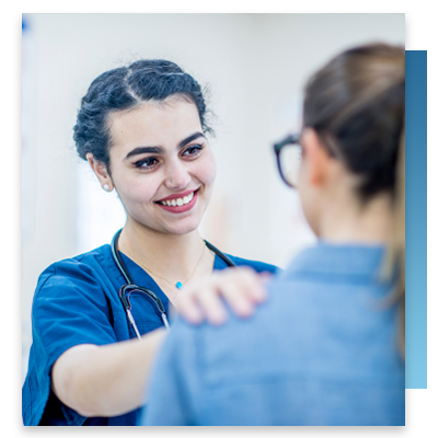 A nurse touching a patient's shoulder
