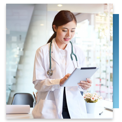 A doctor checking records on a tablet