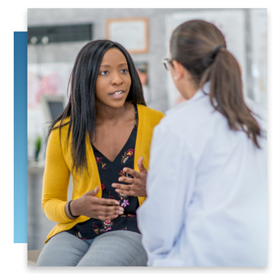 A doctor speaking with a patient