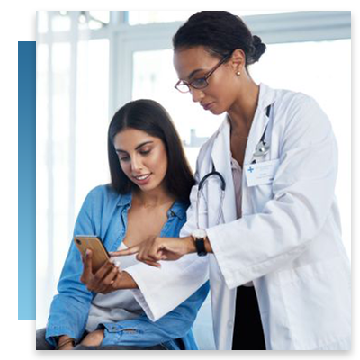 A doctor showing a patient something on her phone