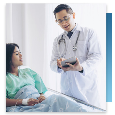 doctor with tablet talking to patient