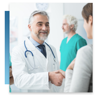 A doctor shaking hands with a patient