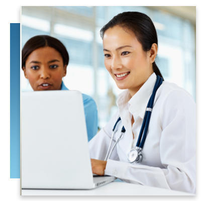 A doctor and nurse looking at a computer