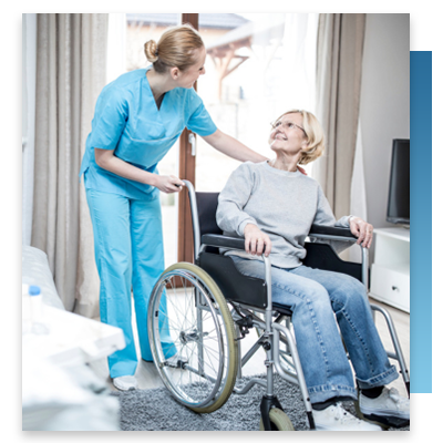 A nurse helping a patient in a wheelchair