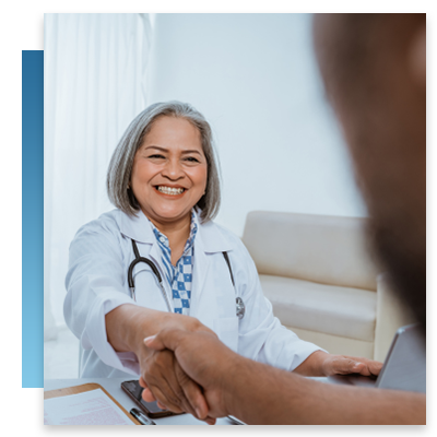 A doctor shaking hands with a patient
