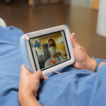 HatchMed-Everett-Facility-09262 2-patient-tapping-pillowcase-comcierge-korean-language