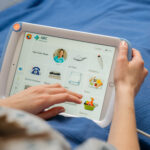 HatchMed-Everett-Facility-09330 2-pillowcase-railclip-mounted-bed-rail-patient-reading-book