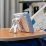 hatchmed-video-stills-78-elderly-patient-holding-pillowcase-back-bed-front
